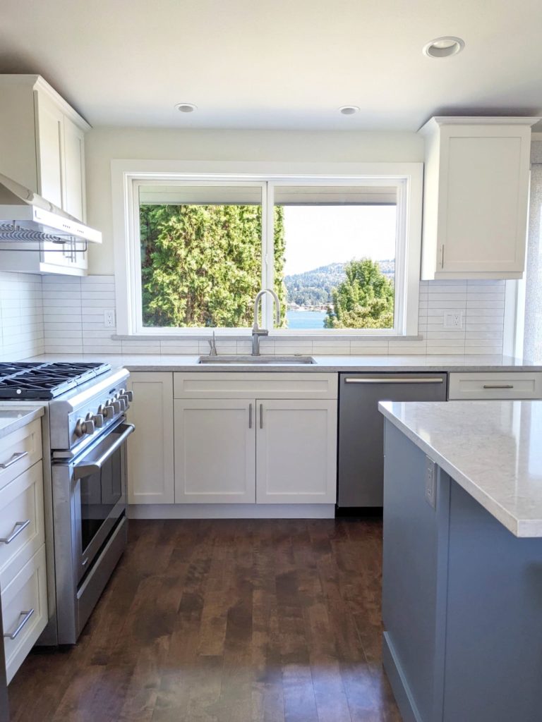 Aging in place kitchen design featuring a white tile backsplash