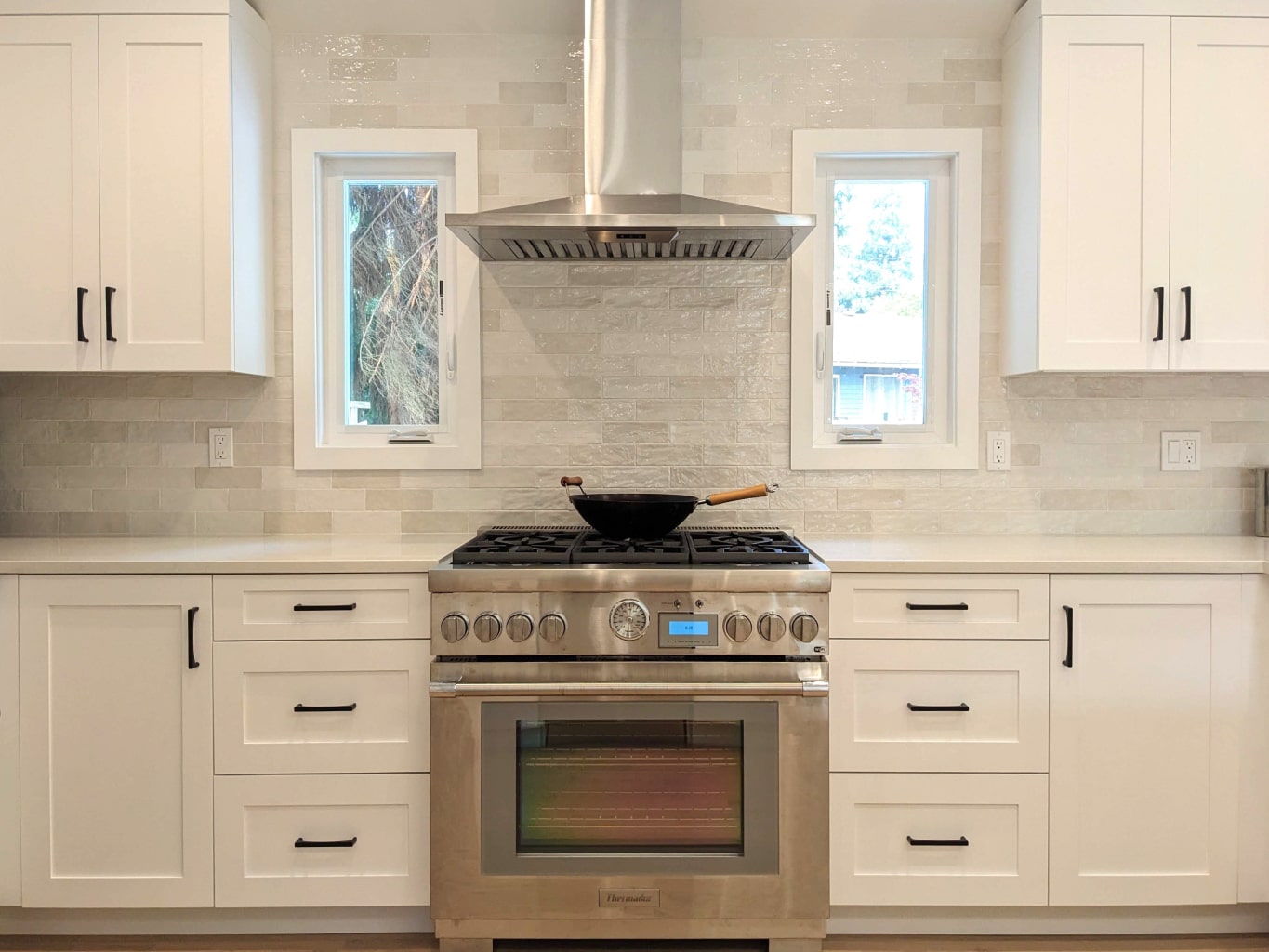 Wall mount rangehood over professional stainless steel range